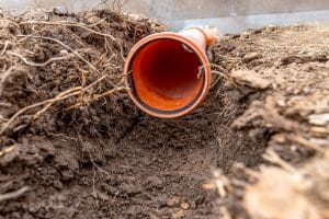 Residential Plumbing and Emergency Services in Northeast Indiana | plastic pvc waste sewer pipe in the ground. construction site