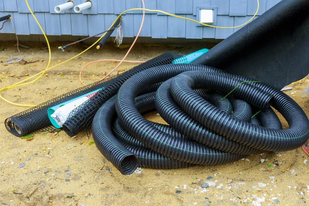 Residential Plumbing and Emergency Services in Northeast Indiana | New black plastic pipes for the drainage pipes system